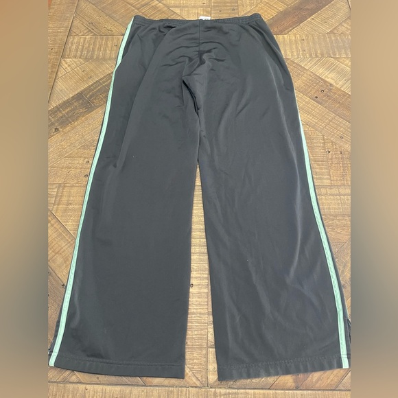 women's black Adidas track pants with mint or light green stripes - Picture 4 of 6